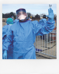 Nurse wearing PPE.